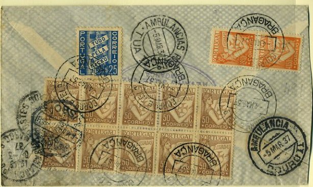 20Lis_536.jpg -     Lote:     536             Descrição:     1937 - Sobretaxa do correio aéreo. Sobrescrito circulado de Bragança (04.03.37) para o Rio de Janeiro, por via aérea por Casablanca (06.03.37) com selos Lusíadas de 50 ctvs (10) e 4$50 (2) + selo de $25 Tudo pela Nação. Carimbo no verso de "AMBULÂNCIAS POSTAIS / TUA I".        Aéreo        Valor Base:     &euro; 20,00     Valor Venda:     &euro;      