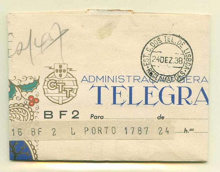 22Lis_0408.jpg -     Lote:    408            Portugal       Descrição:         1936 &mdash; Boas Festas. Impressos de Telegramas. OM BF2 * BF2 &mdash; NATAL ALEGRE E ANO NOVO / MUITO FELIZ. Remetido do Porto para Lisboa (24.12.38). Carimbo batido a preto da "EST. C. DOS TEL. DE LISBOA / RECLAMAÇÕES".        IC       Valor Base:     &euro; 6,00     Valor Venda:     Retirado     