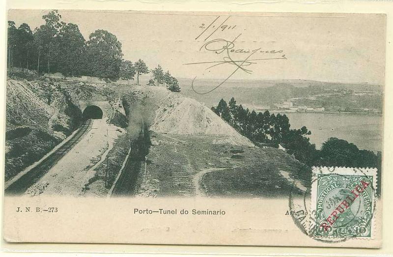 22Lis_2399.jpg -     Lote:    2399      Lotes pelo Correio              Descrição:         Correio ferroviário. Postal ilustrado do Túnel do Seminário, circulado do Porto (03.01.1911) para a Bélgica com selo de 10 reis D. Manuel II com sobrecarga República CE172, obliterado com carimbo "PORTO / CAMINHO DE FERRO".        PI       Valor Base:     &euro; 8,00     Valor Venda:     Retirado     