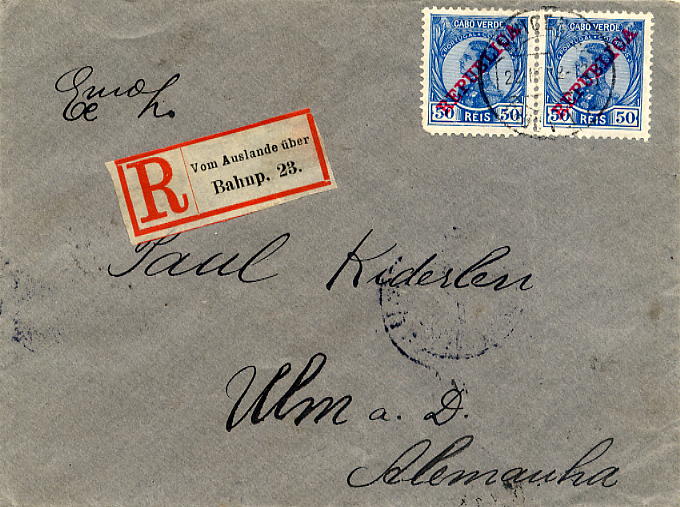 23Lis_0212.jpg -     Lote:    212            Cabo Verde       Descrição:         1912 &mdash; D. Manuel II, com sobrecarga REPUBLICA. Sobrescrito circulado registado de S. Vicente (26.11.13) para a Alemanha (07.12.13) com trânsito por Lisboa (04.11.13) com par de selos de 50 reis azul CE106. MB.        Carta       Valor Base:     &euro; 30,00     Valor Venda:     &euro; 30,00     