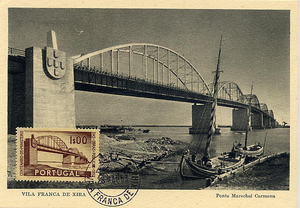 23Lis_0514.jpg -     Lote:    514            Portugal       Descrição:         1952 &mdash; 1.º Centenário do Ministério das Obras Públicas. Ponte Marechal Carmona em Vila Franca de Xira. Postal ilustrado com selo de 1$00 CE755, obliterados com marca de dia de Vila Franca de Xira (28.05.53). MB e MR.        PM       Valor Base:     &euro; 15,00     Valor Venda:     Retirado     