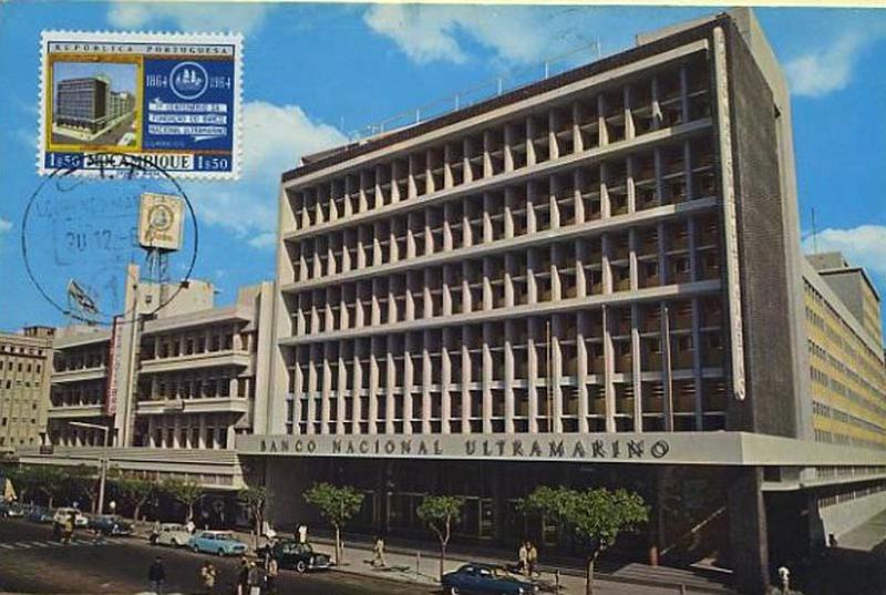 23Lis_0552.jpg -     Lote:    552            Ilhas e Colónias       Descrição:         1964 &mdash; Banco Nacional Ultramarino. Postal ilustrado com o edifício do BNU em Lourenço Marques, com selo do 1.º Centenário da Fundação do BNU, CE479, obliterados com carimbo de Lourenço Marques (20.12.64).        PM       Valor Base:     &euro; 5,00     Valor Venda:     &euro; 5,00     