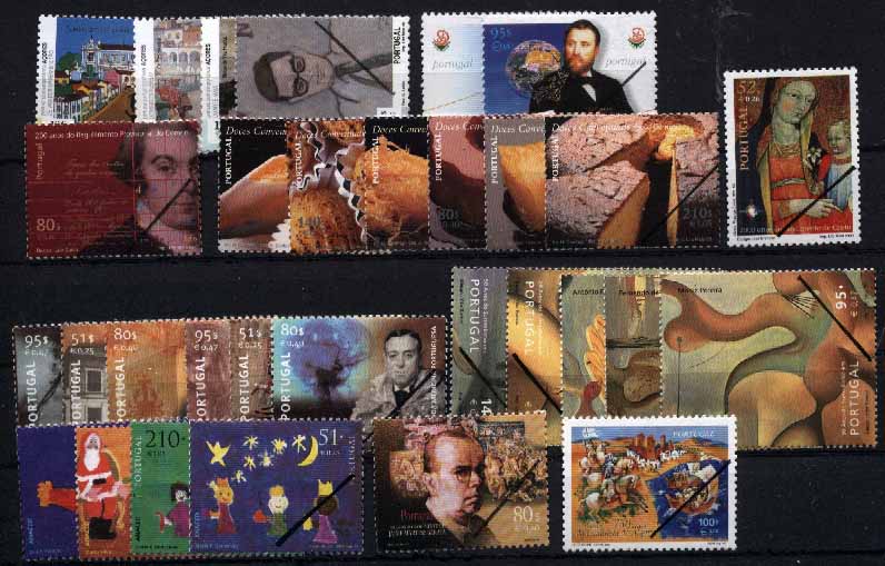 23Lis_1060.jpg -     Lote:    1060            Portugal       Descrição:         1999 &mdash; 50 anos do Surrealismo em Portugal + Pintura Contemporânea dos Açores + 125 Anos da UPU + 200 Anos do Reg. Prov. dos Correios + Doces Conventuais (1.º grupo) + 2000 Anos no Nascimento de Cristo + Vultos da Medicina Portuguesa + Natal 99 + Centenário de Jaime Barata. Séries completas, com traço oblíquo no canto inferior direito, normalmente utilizado em selos de oferta aos órgãos de comunicação social.        PRV       Valor Base:     &euro; 15,00     Valor Venda:     Retirado     