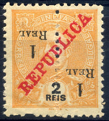 23Lis_1203.jpg -     Lote:    1203            Índia       Descrição:         1914 &mdash; D. Carlos I, tipo Mouchon com sobrecarga REPUBLICA, sobretaxa e perfurados verticalmente ao meio. CE289, 1 real s/ 2 reis laranja. Selo com a sobretaxa invertida.        *       Valor Base:     &euro; 15,00     Valor Venda:     &euro; 15,00     
