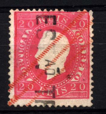 1799.jpg -     Lote:    1799            Portugal       Descrição:         Carimbos nominativos. 1884 &mdash; D. Luís I, fita direita. Nova cor. CE66, 20 reis carmim. Selo obliterado com carimbo nominativo batido a preto EST.AÕ TEL. + marca de roulettes a vermelho.        O       Valor Base:     &euro; 10,00     Valor Venda:     Retirado     