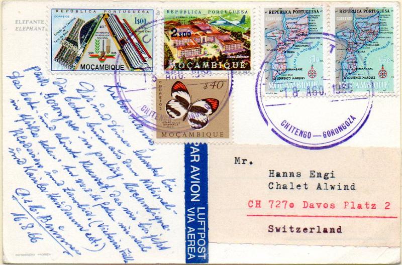 1914.jpg -     Lote:    1914            Moçambique       Descrição:         Carimbos circulares, formato grande. Postal ilustrado circulado de Chitengo (18.08.66) para a Suíça com selos  CE392, 412 (2), 489 e CA25, obliterados com carimbo batido a azul "CHITENGO-GORONGOZA".        PI       Valor Base:     &euro; 15,00     Valor Venda:     &euro; 18,00     