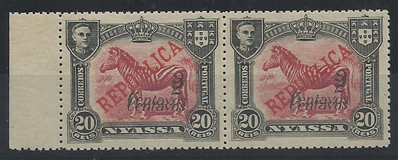 1200.jpg -     Lote:    1200            Companhia do Niassa       Descrição:         1921 &mdash; D. Manuel II, com sobretaxa de Lisboa. CE86, 2C s/ 20 reis carmim. Par horizontal bordo de folha com dupla sobrecarga. Não catalogada.        O       Valor Base:     &euro; 30,00     Valor Venda:     &euro; 34,00     
