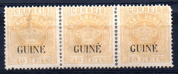 1282.jpg -     Lote:    1282            Guiné       Descrição:         1885 &mdash; Tipo Coroa. Selos de Cabo Verde, com sobrecarga "GUINÉ", grande. Novas cores. CE22, 40 reis amarelo, denteado 12 &frac12;. Tira horizontal de 3 selos, um deles com o cliché de MOÇAMBIQUE. Valor de catálogo &euro; 102,00.        **       Valor Base:     &euro; 25,00     Valor Venda:     &euro; 30,00     