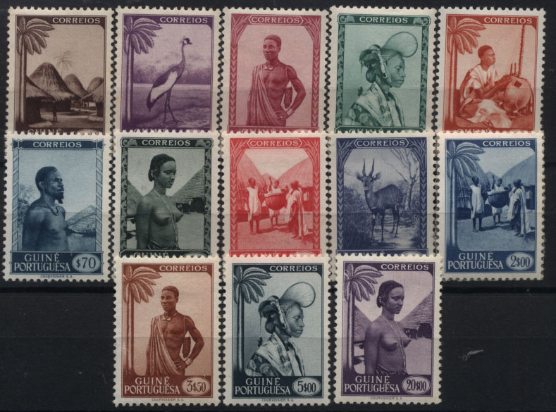 1288.jpg -     Lote:    1288            Guiné       Descrição:         1948 &mdash; Motivos da Guiné. CE248/260. Série completa. Selo de 2$00 com papel seda colado no verso. Valor de catálogo &euro; 168,00.        ***       Valor Base:     &euro; 25,00     Valor Venda:     &euro; 32,00     