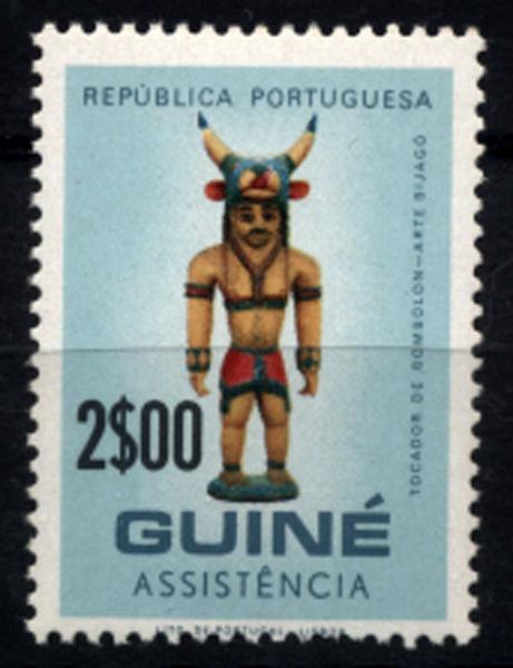 1290.jpg -     Lote:    1290            Guiné       Descrição:         1967 &mdash; Assistência. Artesanato. CE NE2, 2$00 &mdash; TOCADOR DE BOMBOLON.         ***       Valor Base:     &euro; 10,00     Valor Venda:     &euro; 14,00     