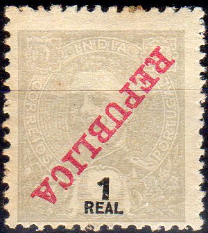 1013.jpg -     Lote:    1013                   Descrição:         1911 &mdash; D. Carlos I Mouchon, com sobrecarga REPUBLICA. CE200, 1 real cinzento. Selo com a sobrecarga invertida.        **       Valor Base:     &euro; 10,00     Valor Venda:     &euro;      