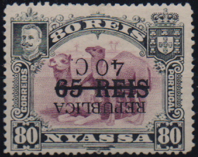 1073.jpg -     Lote:    1073                   Descrição:         1918 &mdash; D. Carlos I, com sobretaxa e sobrecarga REPUBLICA local. CE79, 40c s/ 65 reis s/ 80 reis lilás. Selo com a sobretaxa invertida. Valor de catálogo &euro; 190,00.        *       Valor Base:     &euro; 40,00     Valor Venda:     &euro;      