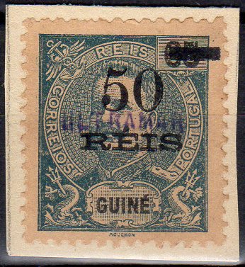 1448.jpg -     Lote:    1448                   Descrição:         1903 &mdash; D. Carlos I Mouchon, com sobretaxa. CE97, 50 s/ 65 reis. Selo recortado de folha de álbum de coleção de uma Direcção ou Estação de Correios das Colónias, remetidos pela Secretaria de Berna, com sobrecarga a azul "ULTRAMAR", para lhes retirar o poder circulatório. MR.        *       Valor Base:     &euro; 45,00     Valor Venda:     &euro;      
