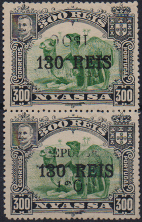 1673.jpg -     Lote:    1673                   Descrição:         1918 &mdash; D. Carlos I, com sobretaxa e sobrecarga REPUBLICA local. CE81, 1$00 s/ 130 reis s/ 300 reis verde. Par vertical, com um selo com a sobretaxa invertida e ambas mal impressas. Provavelmente falsas.        *       Valor Base:     &euro; 20,00     Valor Venda:     &euro;      