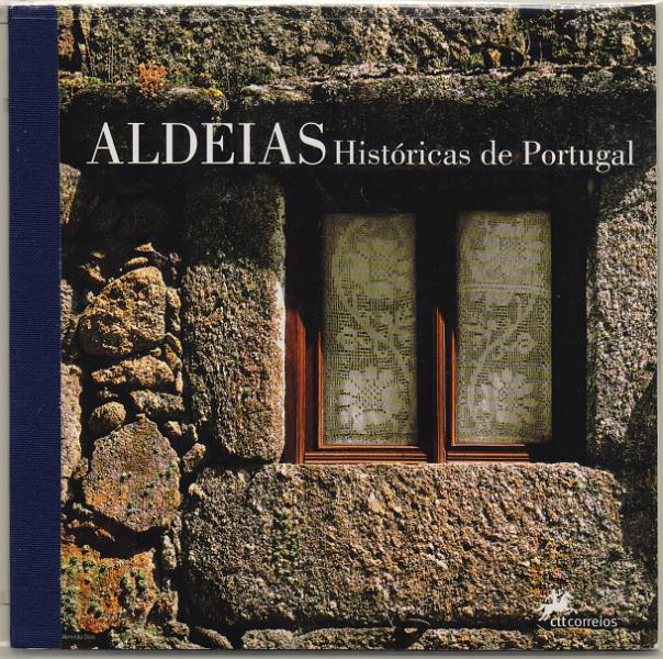2946.jpg -     Lote:    2946      Lotes pelo Correio              Descrição:         2005 &mdash; Aldeias Históricas de Portugal. Caderneta com os 12 blocos emitidos (BLC306 a 317) CE CRT132. Valor de catálogo &euro; 37,00.        CRT       Valor Base:     &euro; 12,00     Valor Venda:     &euro;      