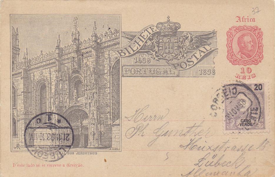 0279.jpg -     Lote:    279            Cabo Verde       Descrição:         1898 &mdash; 4.º Centenário do Descobrimento do Caminho Marítimo para a Índia. Emissão para África. OM1C, 10 reis. Circulado de S. Vicente (10.11.98) para a Alemanha (21.11.98) com trânsito por Lisboa, com selo adicional de 20 reis CE41. MB.        IC       Valor Base:     &euro; 20,00     Valor Venda:     Retirado     
