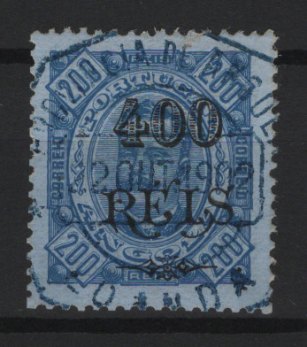 316.jpg -     Lote:    316            Angola       Descrição:         1902 &mdash; D. Carlos I. MF73a, 400 s/ 200 reis, azul s/ azul, denteado 13 &frac12;, papel porcelana, sobretaxa tipo II. Exemplar usado, muito raro, com excelente cor, com um canto reparado. MB e MR. Certificado de peritagem de J. Miranda da Mota, Valor de catálogo &euro; 300,00.         O       Valor Base:     &euro; 75,00     Valor Venda:     &euro;      