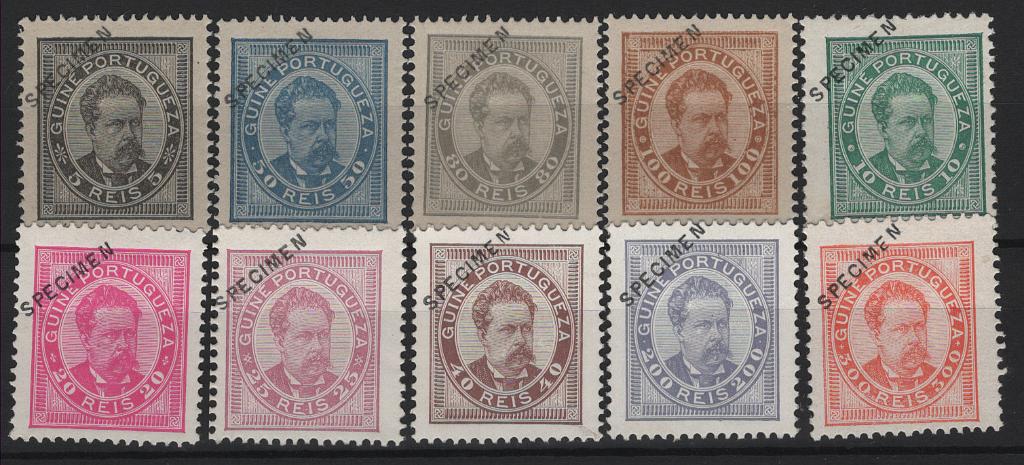 397.jpg -     Lote:    397            Guiné       Descrição:         1886 &mdash; D. Luís I. MF24/33. Série completa composta por 3 selos originais em denteado 12 &frac12; (10, 20, 25, 40, 200 e 300 reis) e 4 reimpressões de 1905, denteado 13 &frac12; (5, 50, 80 e 100 reis), todos com a sobrecarga "SPECIMEN" a preto e oblíqua no canto superior esquerdo. Selos e reimpressões com goma original e leve sinal de charneira. MB e R.         **/ R**       Valor Base:     &euro; 200,00     Valor Venda:     &euro;      