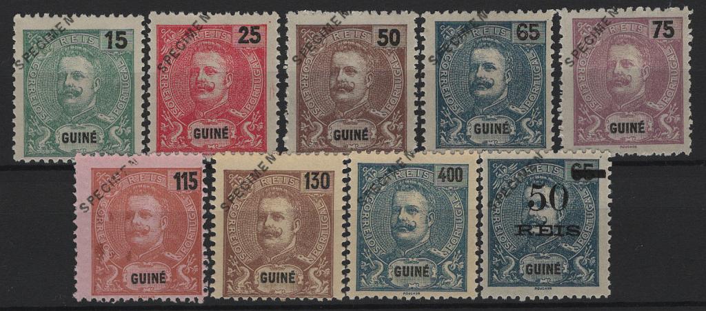 403.jpg -     Lote:    403            Guiné       Descrição:         1903 &mdash; D. Carlos I Mouchon. Novas cores e valores. MF89/96. Série completa com a sobrecarga "SPECIMEN a preto e oblíqua no canto superior esquerdo. Selos originais distribuídos com as reimpressões de 1905, com goma original e leve charneira na generalidade. MB e MR.         **       Valor Base:     &euro; 150,00     Valor Venda:     &euro;      
