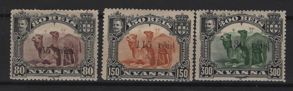 574.jpg -     Lote:    574            Companhia do Niassa       Descrição:         1903 &mdash; D. Carlos I. Selos de 1901, com sobretaxa. MF45/47. Série completa com goma original e sinal de charneira, com boa cor, sem reparações e com ligeira transparência no verso no selo de 115 s/ 150 reis. Valor de catálogo &euro; 255.00.         **       Valor Base:     &euro; 50,00     Valor Venda:     &euro;      