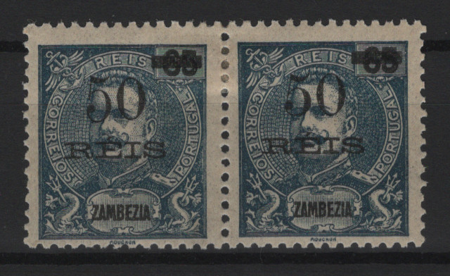 595.jpg -     Lote:    595            Zambézia       Descrição:         1905 &mdash; D. Carlos I, Mouchon, com sobretaxa. MF54 + 54c, 50 s/ 65 reis. Par horizontal, com goma original, boa cor, sem defeitos nem reparações, o primeiro selo com sobretaxa tipo II. MB e R. Valor de catálogo &euro; 213,00.         **       Valor Base:     &euro; 40,00     Valor Venda:     &euro;      