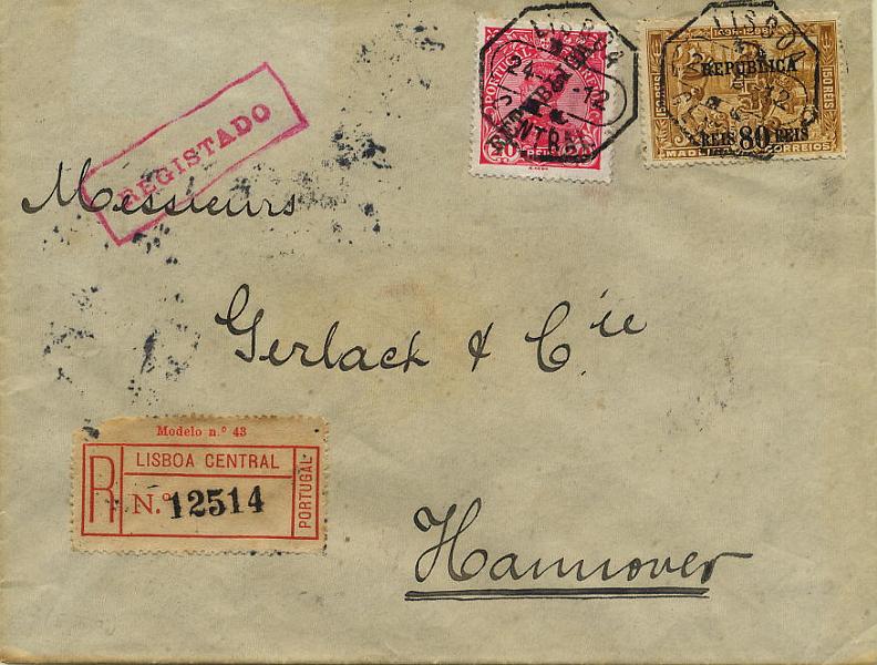 0449.jpg -     Lote:    449            Colecção Clássica - 2.ª parte       Descrição:         1910/11 &mdash; 4.º Centenário do Descobrimento do Caminho Marítimo para a Índia com sobrecarga REPUBLICA sobre selos postais da Madeira + D. Manuel II com sobrecarga REPUBLICA. Sobrescrito circulado registado de Lisboa (24.06.12) para Hanover (27.06.12) com selos de 20 reis CE174 + selo de 80 s/ 150 reis CE203. MB        Carta       Valor Base:     &euro; 30,00     Valor Venda:     Retirado     