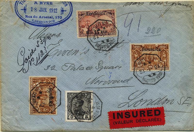 0450.jpg -     Lote:    450            Colecção Clássica - 2.ª parte       Descrição:         1910/11 &mdash; 4.º Centenário do Descobrimento do Caminho Marítimo para a Índia com sobrecarga REPUBLICA sobre selos postais da Madeira + D. Manuel II. Valor declarado (aparado no bordo superior) circulado de Lisboa (18.01.12) para Londres (22.01.12) com trânsito por Madrid (20.01.12) com selos 5 reis CE157 + selo de 15 s/ 5 reis CE199 + dois selos de 100 reis CE204.        Carta       Valor Base:     &euro; 75,00     Valor Venda:     Retirado     
