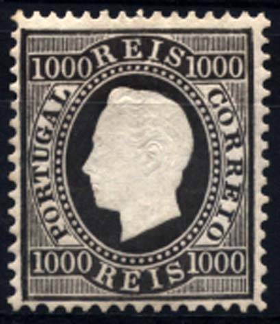 1335.jpg -     Lote:    1335            Portugal       Descrição:         1884 &mdash; D. Luís I, fita direita. Nova cor e valor. CE67, 1000 reis preto, denteado 12 &frac12;. Selo regomado.         RG***       Valor Base:     &euro; 75,00     Valor Venda:     &euro; 75,00     