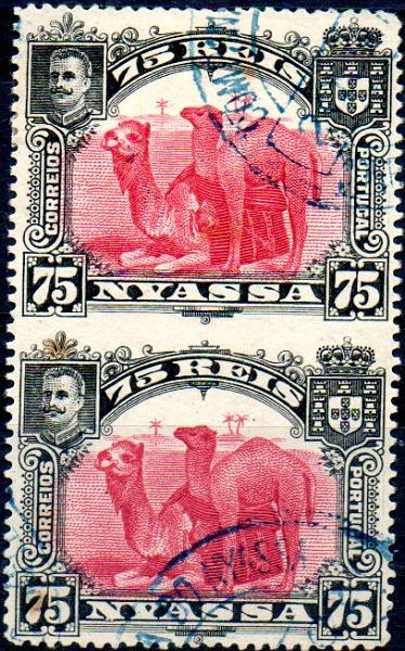 0023.jpg -     Lote:    23      Colecção IMPÉRIO      Companhia do Niassa       Descrição:         1901 &mdash; D. Carlos I (Girafa e Camelos). CE34, 75 reis carmim. Par horizontal não denteado verticalmente ao centro. MB e MR.        O       Valor Base:     &euro; 50,00     Valor Venda:     &euro; 130,00     