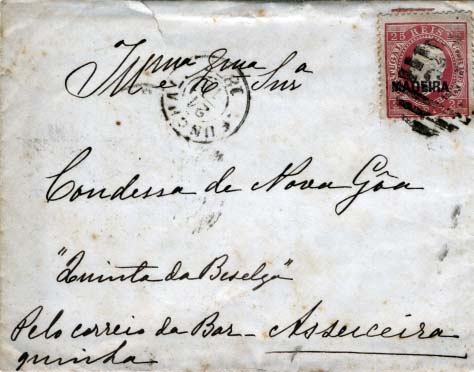 0424.jpg -     Lote:    424            Madeira       Descrição:         1871/76 &mdash; D. Luís I, fita direita com sobrecarga "MADEIRA". CE17, 25 reis carmim, papel liso, denteado 12 &frac12;, sobrecarga tipo B, cunho XV, sobre carta circulada de Angra do Heroísmo (21.10.1877) para Asseiceira, obliterados com carimbo da 2.ª reforma batido a preto "45 &mdash; FUNCHAL". Manuscrito "Pelo correio da Barquinha". MB.        Carta       Valor Base:     &euro; 20,00     Valor Venda:     &euro; 55,00     