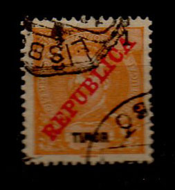 1935.jpg -     Lote:    1935            Timor       Descrição:         Carimbos circulares datados. 1911 &mdash; D. Carlos I Mouchon com sobrecarga REPUBLICA. CE113, 1 avo laranja, denteado 12 &frac12;, obliterado com carimbos batidos a preto de BALIBÓ e LISBOA.        O       Valor Base:     &euro; 5,00     Valor Venda:     &euro; 6,00     