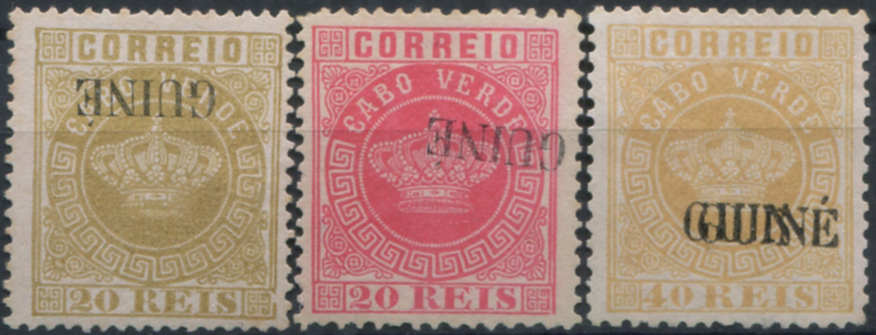 470.jpg -     Lote:    470                   Descrição:         1879/84 &mdash; Coroa. Selos de Cabo Verde, com sobrecarga "GUINÉ" grande. Lote com 3 selos: MF12, 20 reis bistre, denteado 13 &frac12; com a sobrecarga INVERTIDA; MF20, 20 reis rosa, denteado 12 Ÿ, com a sobrecarga INVERTIDA e deslocada (com um dente curto) e MF22, 40 reis amarelo, denteado 12 Ÿ com DUPLA sobrecarga FALSAS.          *       Valor Base:     &euro; 35,00     Valor Venda:     &euro;      