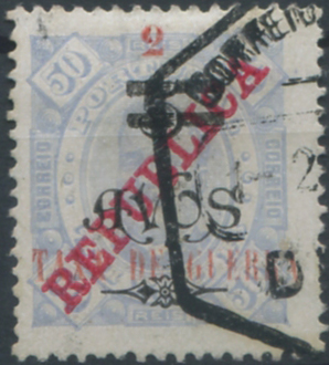 815.jpg -     Lote:    815                   Descrição:         1919 &mdash; Imposto Postal. D. Carlos I, com sobretaxa "2 / TAXA DE GUERRA", tipografada localmente. MF IP2, 2 avos s/ 5 avos s/ 50 reis azul claro, papel pontinhado, denteado 13 &frac12;. Exemplar muito raro, com boa cor, usado com carimbo datado de Dili, sem defeitos nem reparações. Certificado de peritagem de Leilões P. Dias, Lda. Valor de catálogo &euro; 3.400,00.         O       Valor Base:     &euro; 1.500,00     Valor Venda:     &euro;      