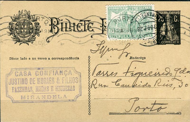0386.jpg -     Lote:    386            Portugal       Descrição:         1924/26 &mdash; Ceres. OM74, 25c preto, cartolina creme. Circulado de Mirandela (13.12.28) para o Porto (14.12.28) com selo adicional de 10c verde do imposto postal (Padrões da Grande Guerra" CE IP14.         IC       Valor Base:     &euro; 25,00     Valor Venda:     Retirado     