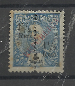 1458.jpg -     Lote:    1458            Índia       Descrição:         1914 &mdash; D. Carlos I com sobrecarga REPUBLICA local, perfurados ao meio e com sobretaxa. NÃO CATALOGADO. 1 &frac12; reis s/ 4 Tangas azul. Selo com pontos de óxido         *       Valor Base:     &euro; 15,00     Valor Venda:     &euro;      