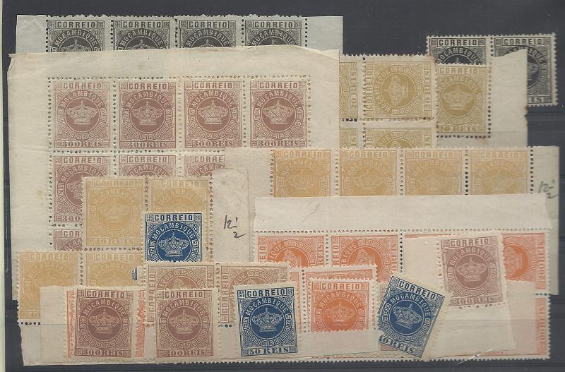 1521.jpg -     Lote:    1521            Moçambique       Descrição:         1877/85 - Tipo Coroa. Lote composto por: CE1 (12) (bloco de 12 + par); CE3 (8) tira de 4 e quadra; CE5 (8), quadra + tira de 3 + isolado + CE9 (14) + CE9 (20) + CE13 (13), em denteado 1q2 &frac12; e 13 &frac12; . Valor de catálogo de 2008 &euro;603.55.         Lote       Valor Base:     &euro; 50,00     Valor Venda:     &euro;      