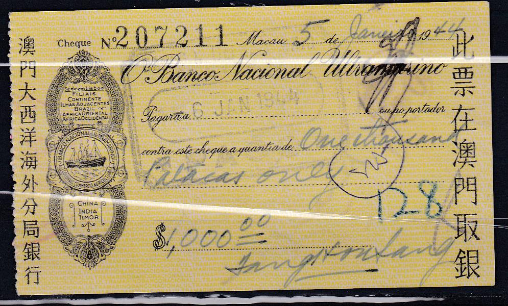 1815.jpg -     Lote:    1815                   Descrição:         Banco Nacional Ultramarino - Macau 05.01.1944, com dimensões 10X6 cm. Imposto de Selo por carimbo no reverso. Invulgar.        CHQ       Valor Base:     &euro; 15,00     Valor Venda:     &euro; 15,00       
