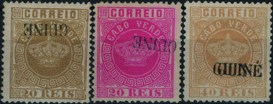 0813.jpg -     Lote:    813            Guiné       Descrição:         1879/84 &mdash; Coroa. Selos de Cabo Verde, com sobrecarga "GUINÉ" grande. Lote com 3 selos: MF12, 20 reis bistre, denteado 13 &frac12; com a sobrecarga INVERTIDA; MF20, 20 reis rosa, denteado 12 Ÿ, com a sobrecarga INVERTIDA e deslocada (com um dente curto) e MF22, 40 reis amarelo, denteado 12 Ÿ com DUPLA sobrecarga FALSAS.          *       Valor Base:     &euro; 35,00     Valor Venda:     &euro;      