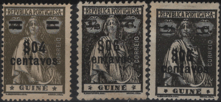 0820.jpg -     Lote:    820            Guiné       Descrição:         1920 &mdash; Ceres, com sobretaxa. Lote composto por 3 selos: MF174, $04 s/ &frac12; c, estrelas I/I, papel pontinhado, denteado 15x14 + dois selos MF175, $06 s/ &frac12; c preto, estrelas papel pontinhado me liso, denteados 12x11 &frac12; e 15x14, com estrelas III/IV e II/IV. Exemplares tidos como FALSOS.         *       Valor Base:     &euro; 15,00     Valor Venda:     &euro;      