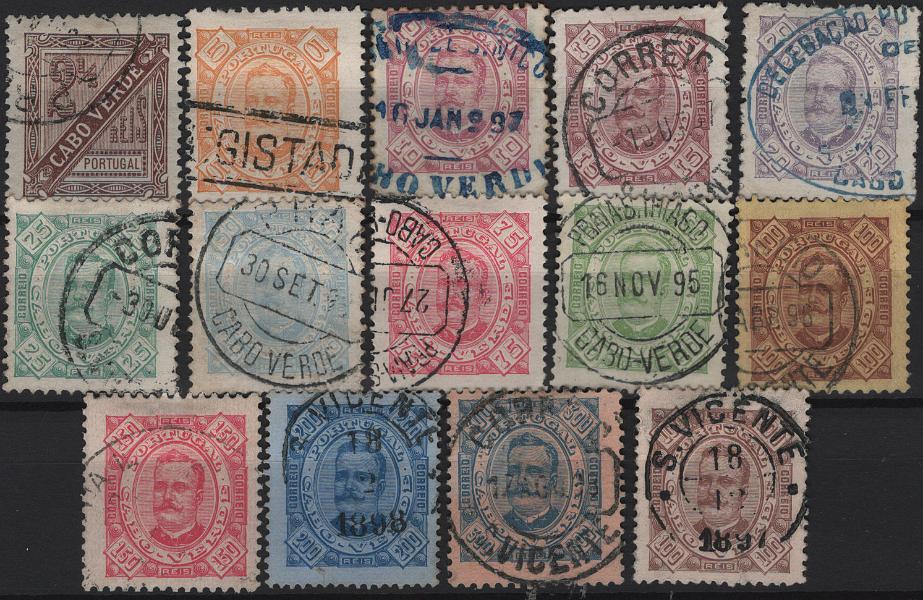1261.jpg -     Lote:    1261            Cabo Verde       Descrição:         1893/95 &mdash; D. Carlos I, tipo Diogo Neto. Mf 24/36. Série completa com denteados básicos, com exceção selo de 200 reis em denteado 13 &frac12;, incluindo ainda selo de 100 reis em denteado 12 Ÿ. Exemplares em estado de uso, sem defeitos nem reparações. Valor de catálogo &euro; 347,00.         O       Valor Base:     &euro; 50,00     Valor Venda:     &euro;      