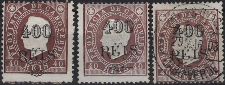 1266.jpg -     Lote:    1266            Cabo Verde       Descrição:         1902 &mdash; D. Luís I, fita direita, com sobretaxa. Mf 60a + Mf60c, 40 reis castanho. Lote composto por 3 selos do tipo II: um em denteado 12 Ÿ em estado de novo e dois em denteado 13 &frac12; em estado de novo e usado. Valor de catálogo &euro; 166,50.         **/O       Valor Base:     &euro; 35,00     Valor Venda:     &euro;      