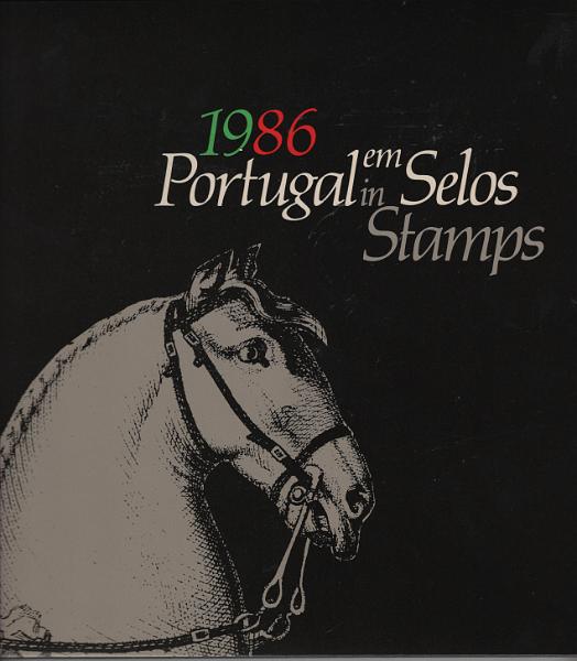 2972.jpg -     Lote:    2972      Lotes pelo Correio             Descrição:         1986 &mdash; Livros anuais. Portugal em selos 198. Valor de catálogo &euro; 170.00.         Livro       Valor Base:     &euro; 15,00     Valor Venda:     &euro;      